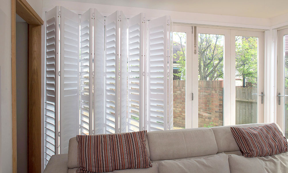Tracked Bi-Fold Shutters